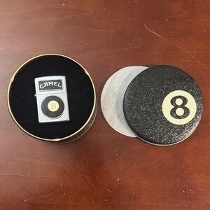 Vintage Camel 8 Ball Zippo in original Tin.